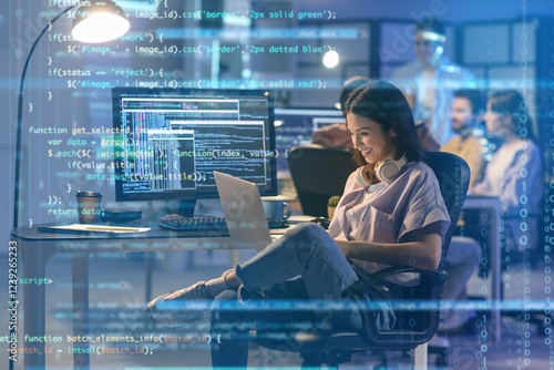 Female programmer working w...
