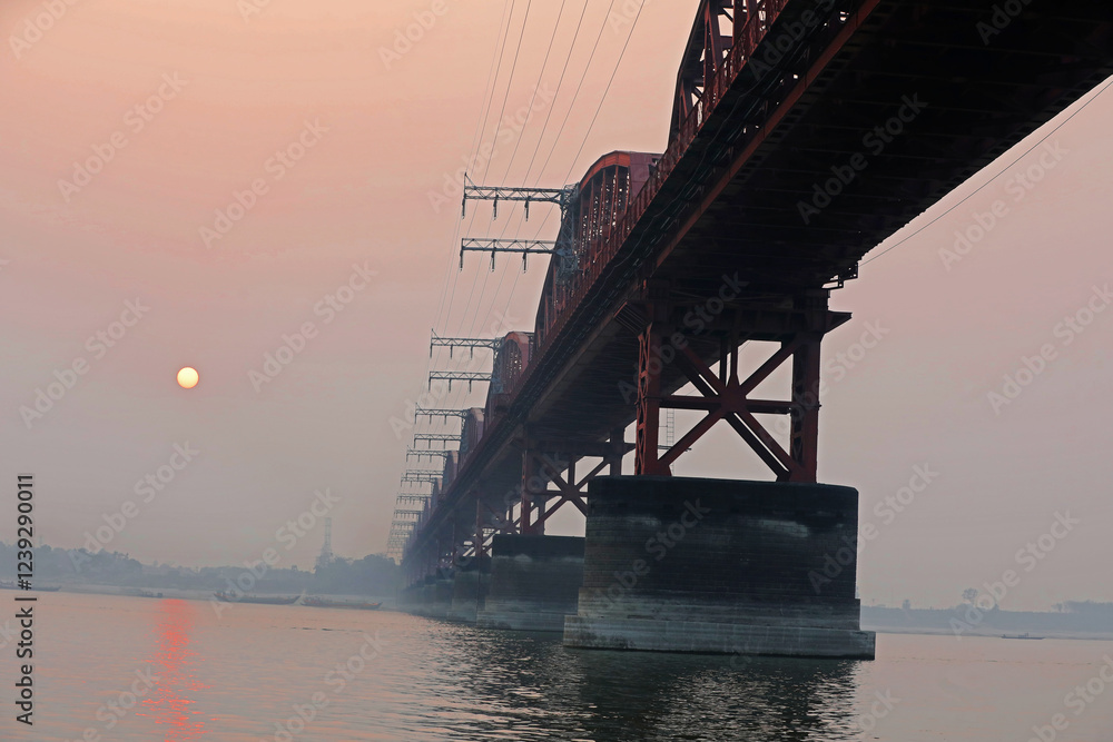 Hardinge Bridge is a Steel Railway Old Bridge over the Padma River in Ishwardi, Pabna, Bangladesh.Hardnge bridge in Foggy Winter morning. Hardinge Bridge is a Steel Railway Old Bridge over the Padma River in Ishwardi, Pabna, Bangladesh.Hardnge bridge in Foggy Winter morning.