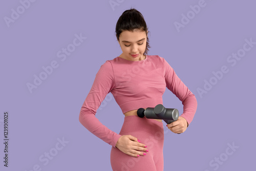 Young woman using percussio...