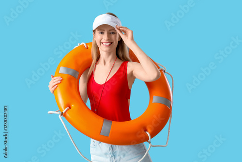 Young female lifeguard in c...