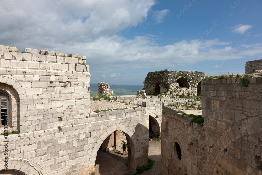 Fototapeta premium Syria Krak des Chevaliers castle on a cloudy summer day