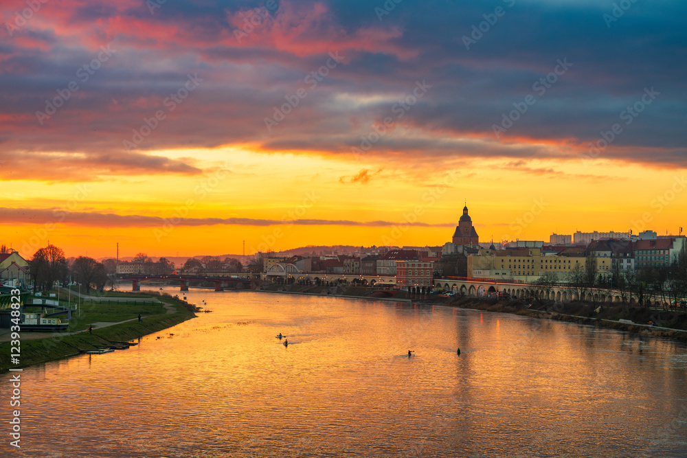 Naklejka premium Gorzow Wielkopolski city skyline overlooking St. Mary's church tower at sunset. Poland
