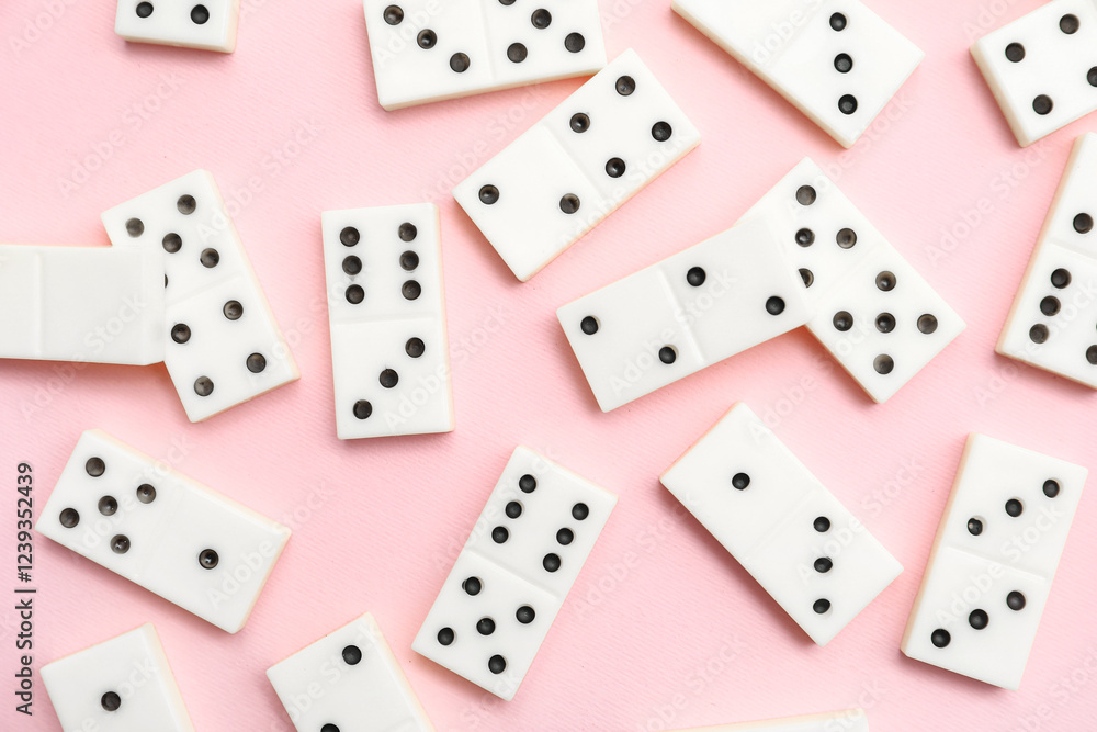 White dominos blocks on pink background White dominos blocks on pink background