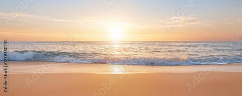A serene beach scene at sunset, with gentle waves lapping at golden sand under a colorful sky.