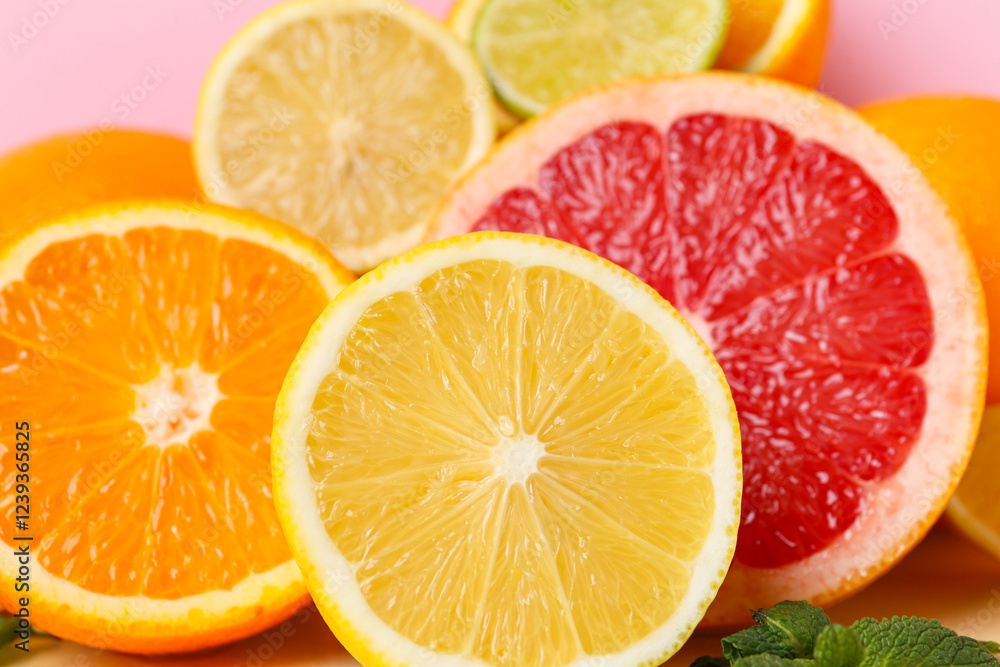 Different cut citrus fruits, closeup Different cut citrus fruits, closeup