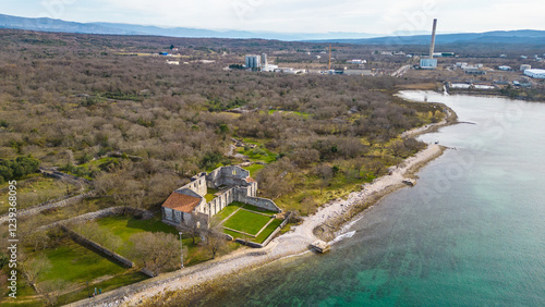 A breathtaking aerial drone view of Fulfinum Mirine, an ancient Roman archaeological site located on the picturesque island of Krk, Croatia