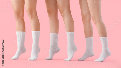 Multiple female legs in whi...