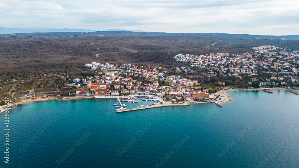 Fototapeta premium A stunning aerial drone view of Amiss Atea Camping Resort, located near the charming town of Njivice on the beautiful island of Krk, Croatia