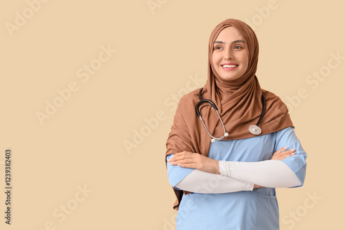 Female Muslim doctor in hij...