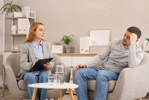Female psychologist working...
