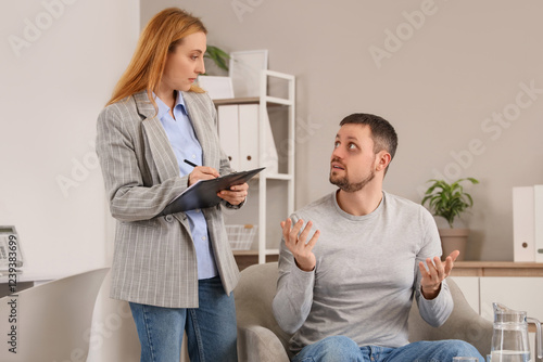 Male drug addict talking to...