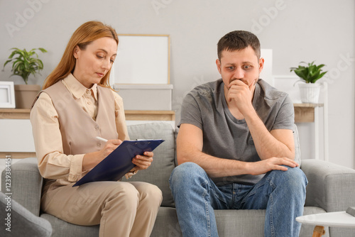 Female psychologist working...