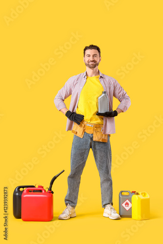 Young man with canisters on...