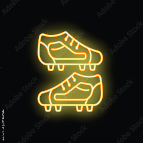 Bright yellow neon sign showing a pair of soccer cleats on a black background