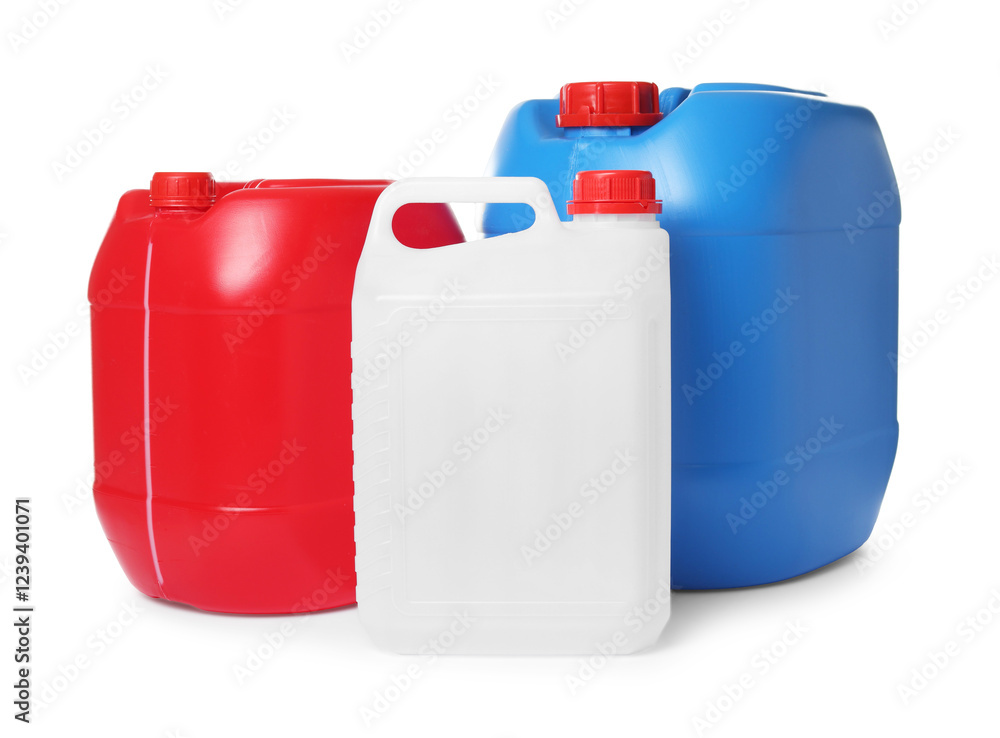 Three colorful plastic canisters isolated on white Three colorful plastic canisters isolated on white