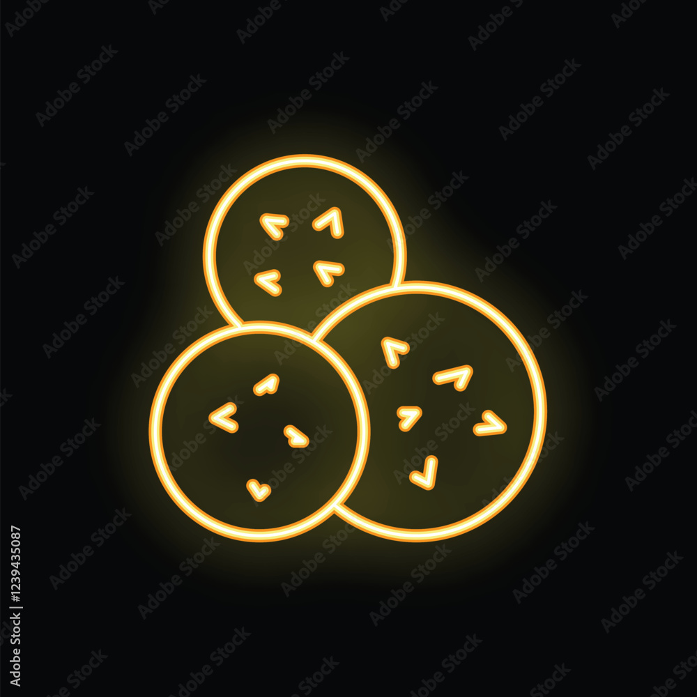 Fototapeta premium Yellow neon icon of three cookies with chocolate chips glowing on a black background