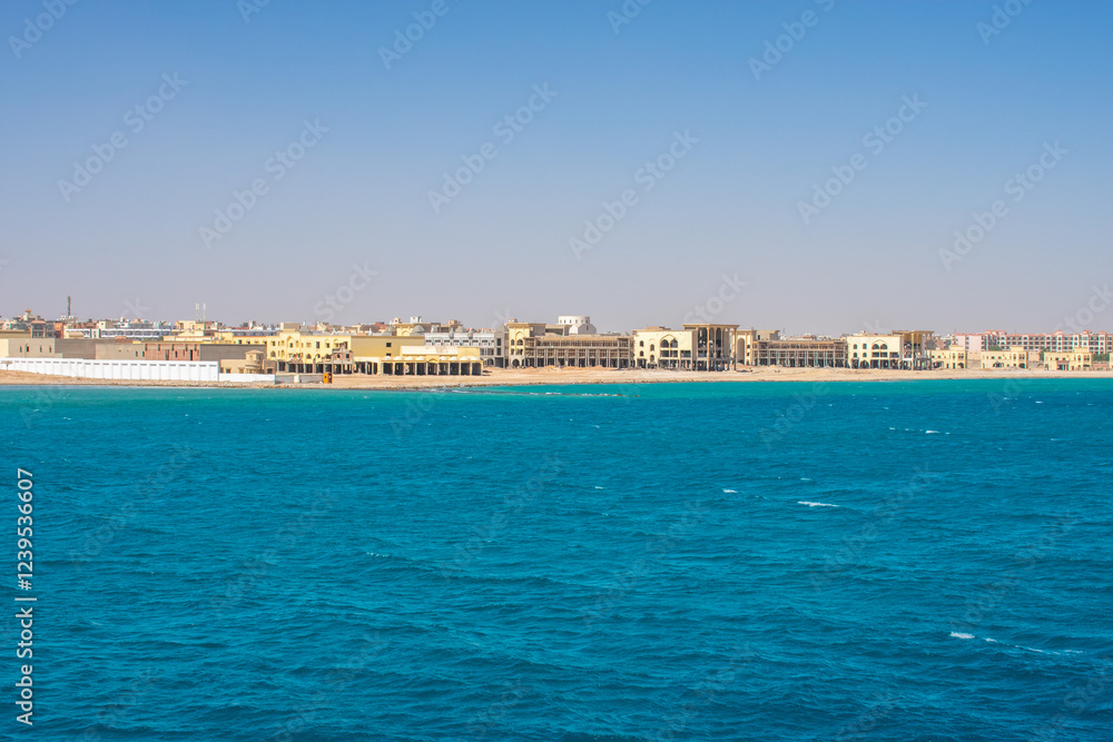 View from boat on Red Sea And Hurghada in Egypt. Cristal clear water and View at city. View from boat on Red Sea And Hurghada in Egypt. Cristal clear water and View at city.