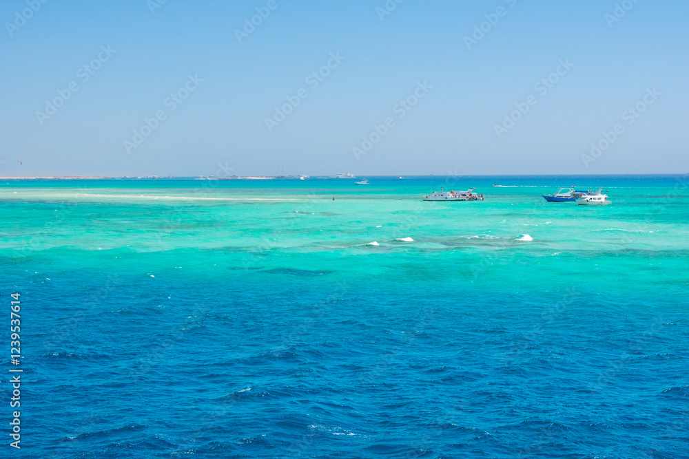 View from boat on Red Sea And Hurghada in Egypt. Cristal clear water and View at city. View from boat on Red Sea And Hurghada in Egypt. Cristal clear water and View at city.
