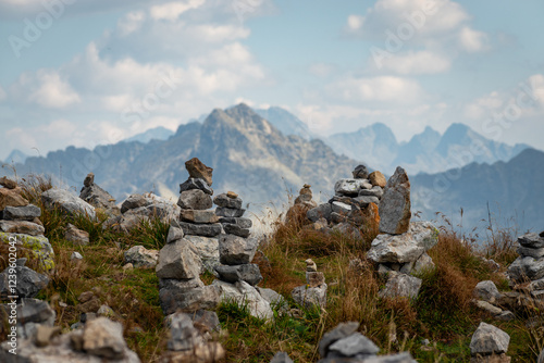 Fototapeta Naklejka Na Ścianę i Meble -  Rock cairns on a mountain peak in the Tatra Mountains