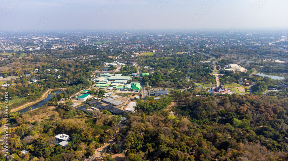 Obraz premium Aerial view of Royal Park Rajapruek Chiang Mai, Thailand, showcasing its serene beauty and surrounding landscape