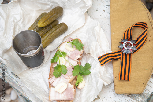 shot of vodka and snack of lard and pickled cucumber,Russians celebrate February 23,Defender of Fatherland Day,May 9,Victory Day,grandfather's awards,St.George ribbon,Order of the Great Patriotic War, photo