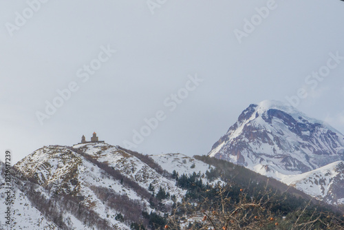 Gergeti Trinity Church, Georgia in Winter photo