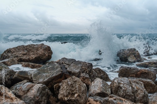 Waves Crashing Against Rocky Shoreline 