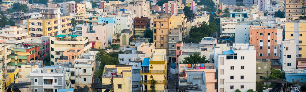 Fototapeta premium Panoramic view of colorful buildings in Vijayawada in Andhra Pradesh, India.