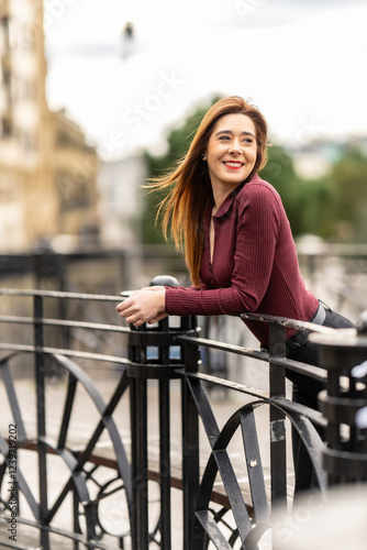 Photography Young business woman relaxing on a bridge in prague old town square, czech repub