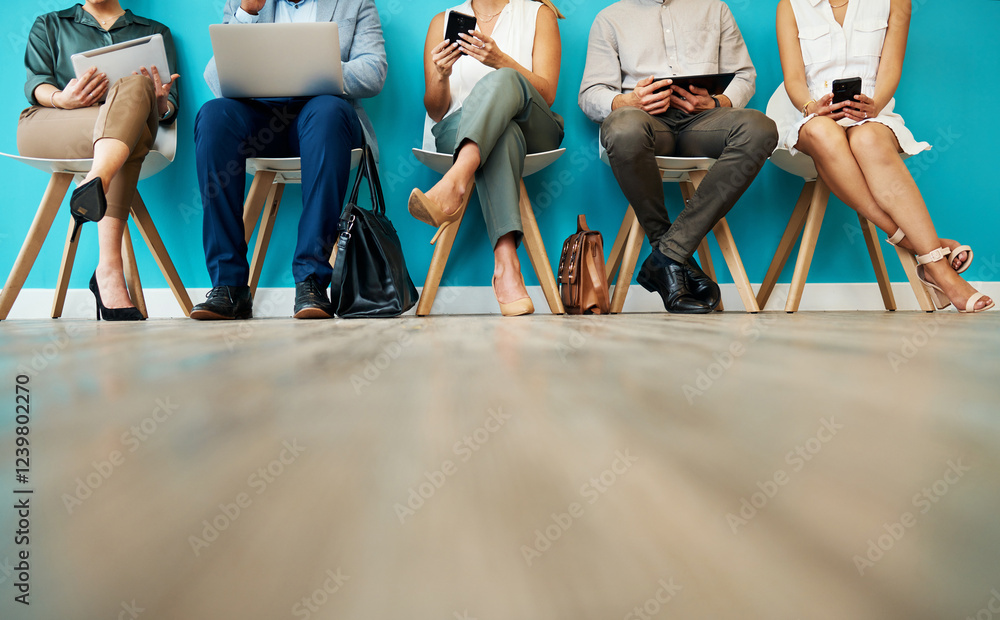 Business people, legs and waiting room with technology for career opportunity, interview or job at office. Group, employees or candidates with laptop or phone in row for company info on mockup space