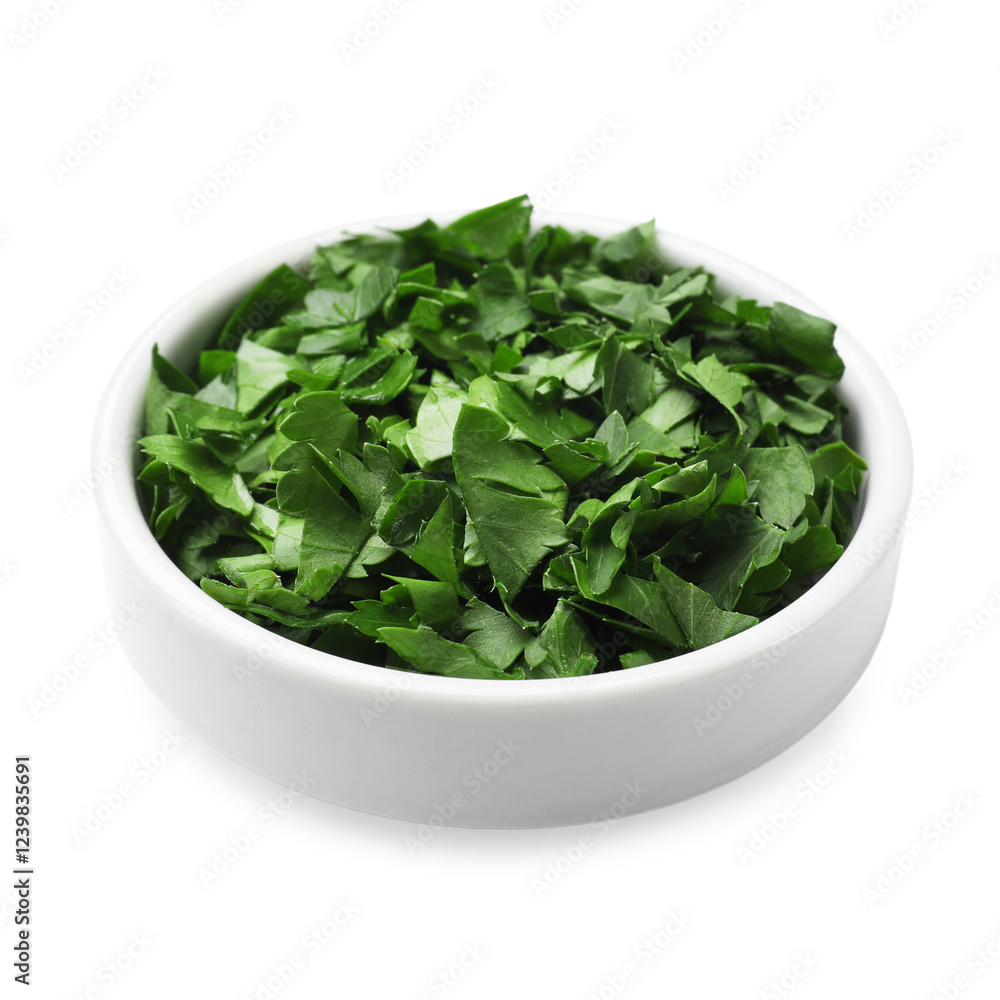 Chopped parsley in bowl isolated on white Chopped parsley in bowl isolated on white