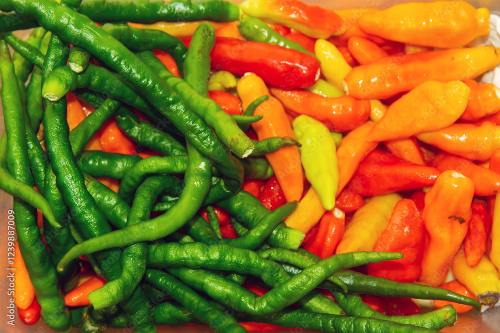 a bunch of green chilies and red chilies a bunch of green chilies and red chilies