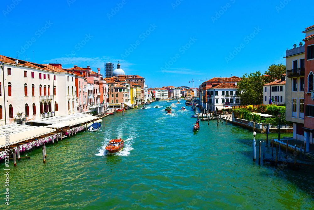 Fototapeta premium Villages along the river and boats passing through the village center