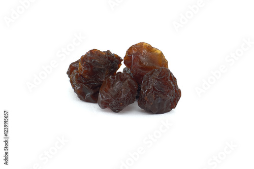 Wallpaper Mural Several dark raisins on a pristine white background; ideal for recipes, baking, or healthy snacking. Torontodigital.ca