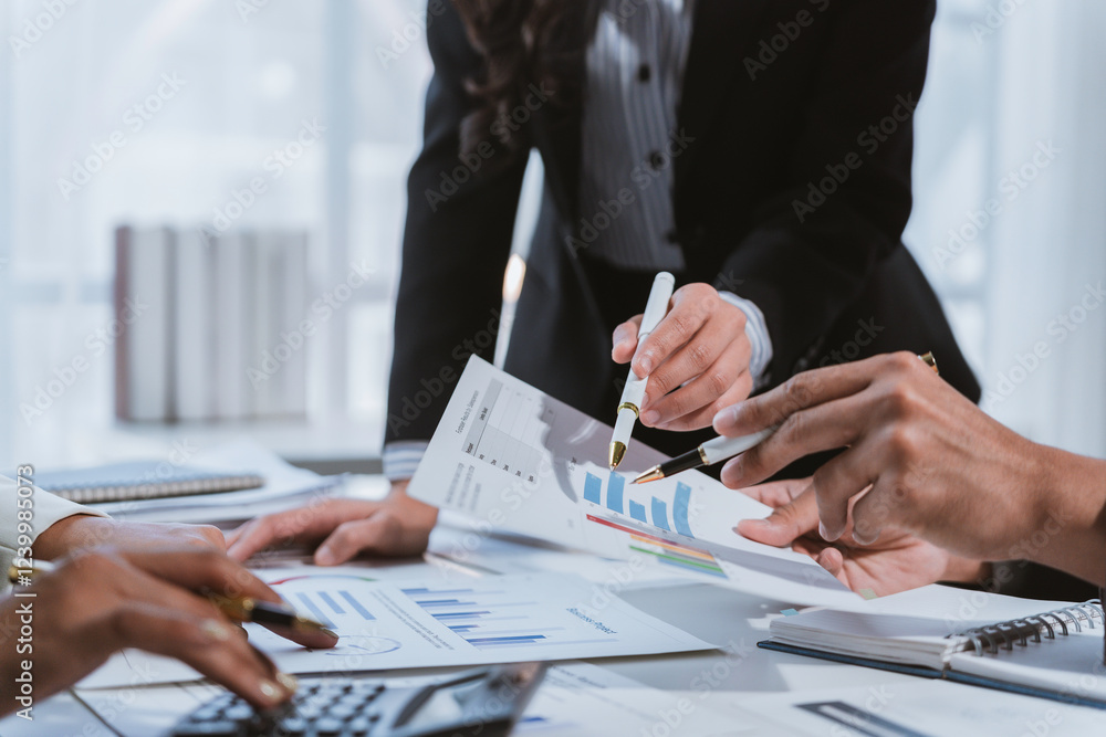 Business people analyzing financial charts and graphs showing market data Business people analyzing financial charts and graphs showing market data