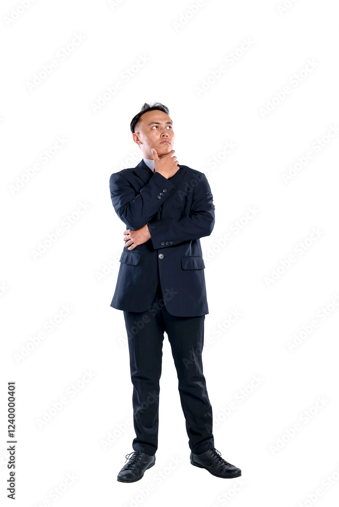 Portrait of an Asian businessman standing while thinking about something isolated over a white background. Concept of business, ideas, analyzing or planning Portrait of an Asian businessman standing while thinking about something isolated over a white background. Concept of business, ideas, analyzing or planning