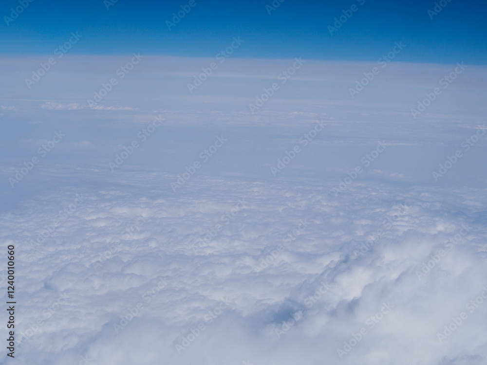 Overlooking the sea of clouds from the plane Overlooking the sea of clouds from the plane