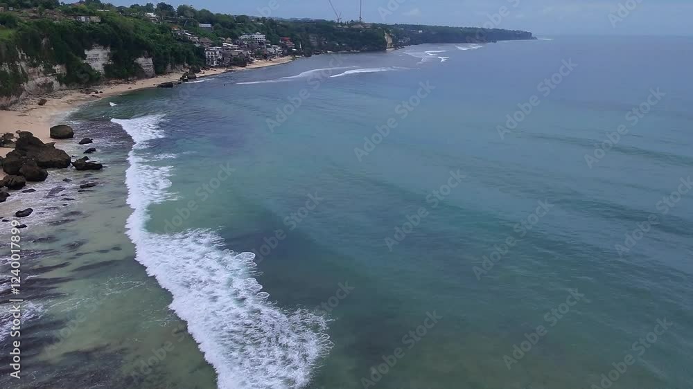 Aerial view of the island coast and the blue ocean horizon Aerial view of the island coast and the blue ocean horizon