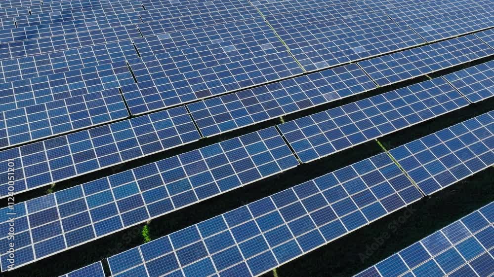 Aerial overview of solar panels rural producing clean and renewable energy, dolly across backdrop background Aerial overview of solar panels rural producing clean and renewable energy, dolly across backdrop background