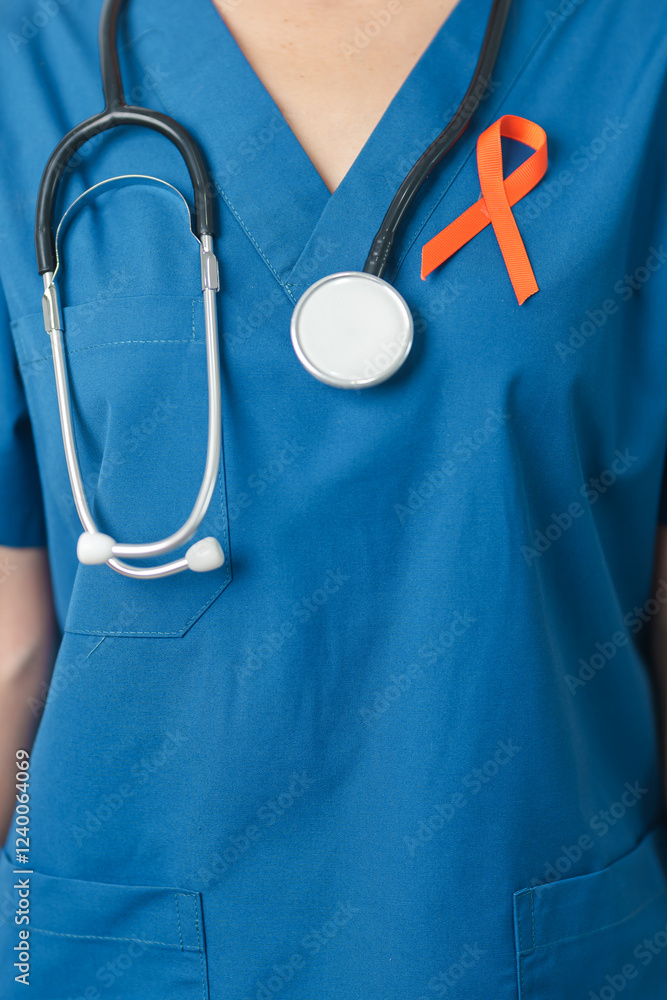 Doctor with Orange Ribbon for Leukemia, Kidney cancer day, world Multiple Sclerosis, CRPS, Self Injury Awareness month. Healthcare and word cancer day concept Doctor with Orange Ribbon for Leukemia, Kidney cancer day, world Multiple Sclerosis, CRPS, Self Injury Awareness month. Healthcare and word cancer day concept