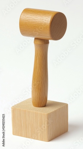 Wooden mallet on a square base used for woodworking and crafts in a workshop ...