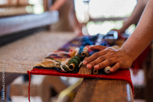 Telar de lana artesanal con colores naturales en teotitlan Oaxaca, México photo