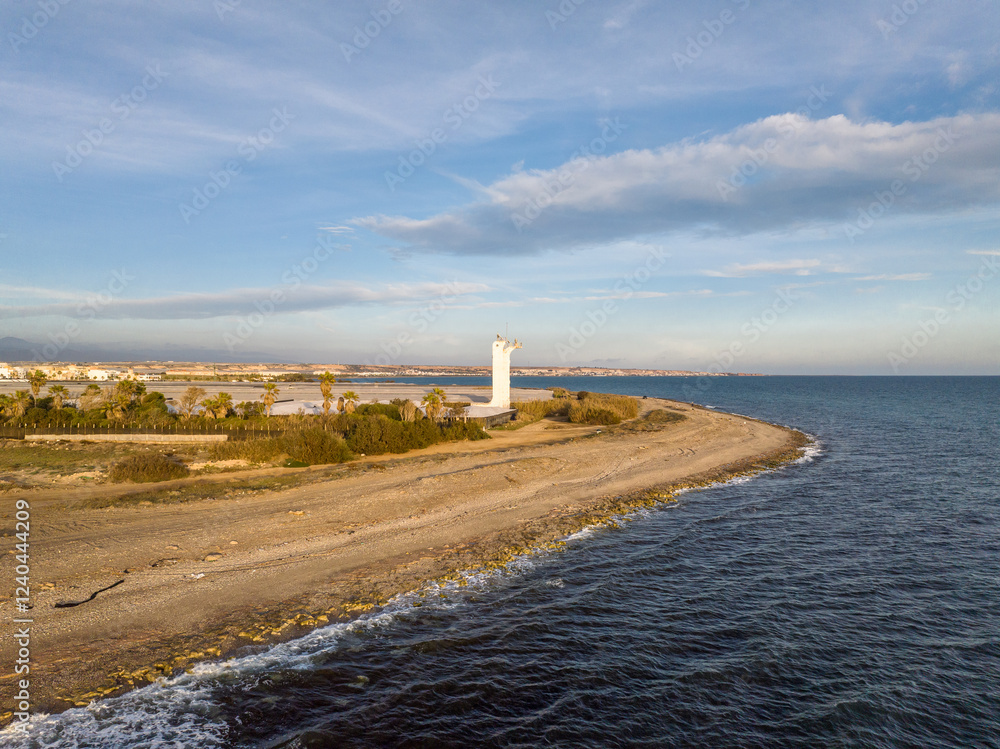 Fototapeta premium Faro Guardias Viejas o Punta de los Baños en el Ejido, Almeria, Andalucia