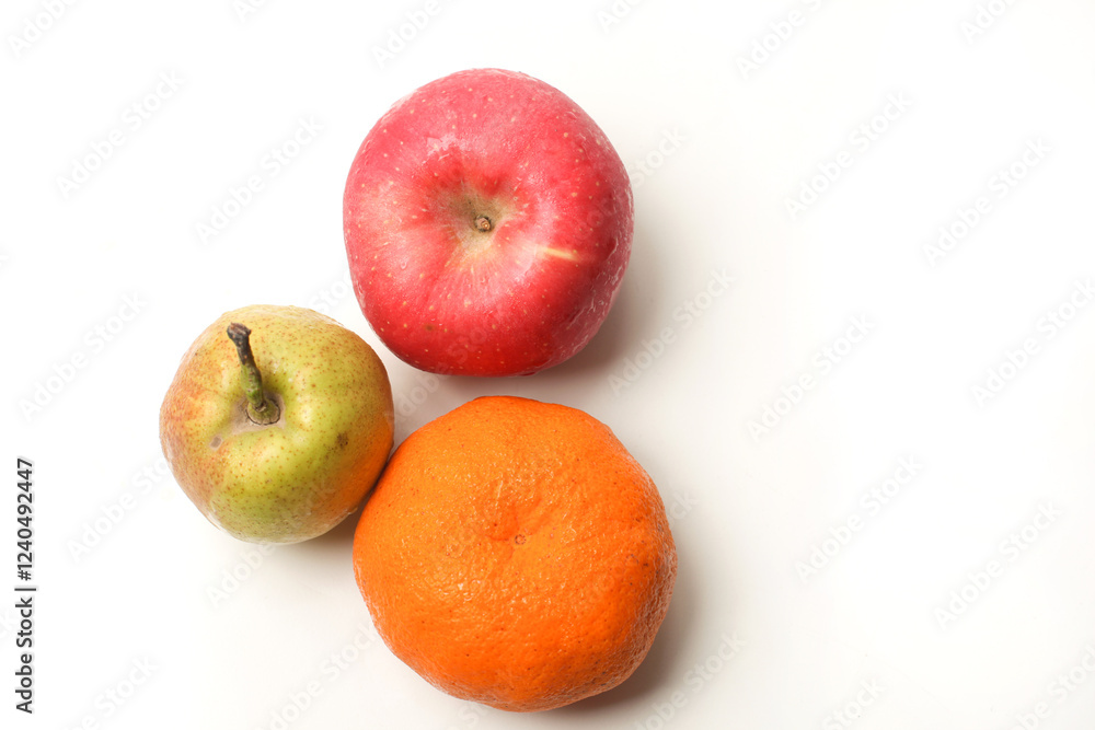 An apple, pear, and orange isolated on white background, top view An apple, pear, and orange isolated on white background, top view