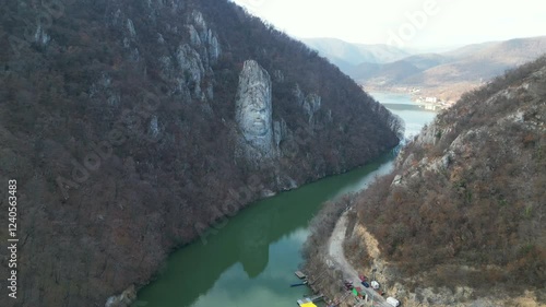Gulf on Danube river in Big Boilers region , western Romania, where sits the carved face in stone of the king Decebal , historical figure for Romanians, aerial drone view