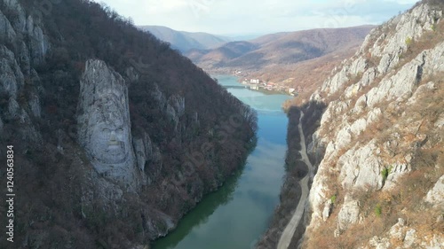 Gulf on Danube river in Big Boilers region , western Romania, where sits the carved face in stone of the king Decebal , historical figure for Romanians, aerial drone view