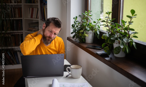 casual businessman working on a laptop