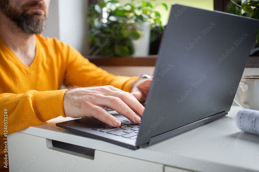 casual businessman working on a laptop casual businessman working on a laptop