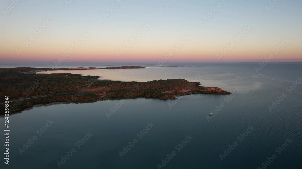 Aerial view of tranquil Cygnet Bay Pearl Farm and expansive coastline at sunset, Broome, Australia. Aerial view of tranquil Cygnet Bay Pearl Farm and expansive coastline at sunset, Broome, Australia.