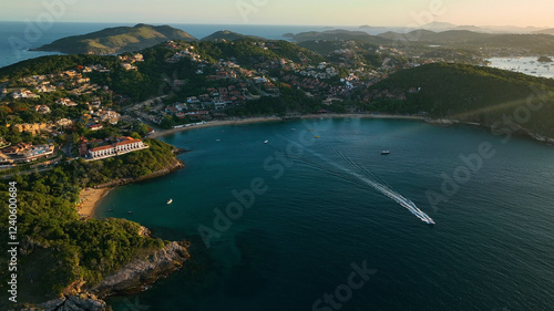 Aerial view of beautiful coastal beach and serene ocean with islands and boats, Armacao dos Buzios, Brazil. photo